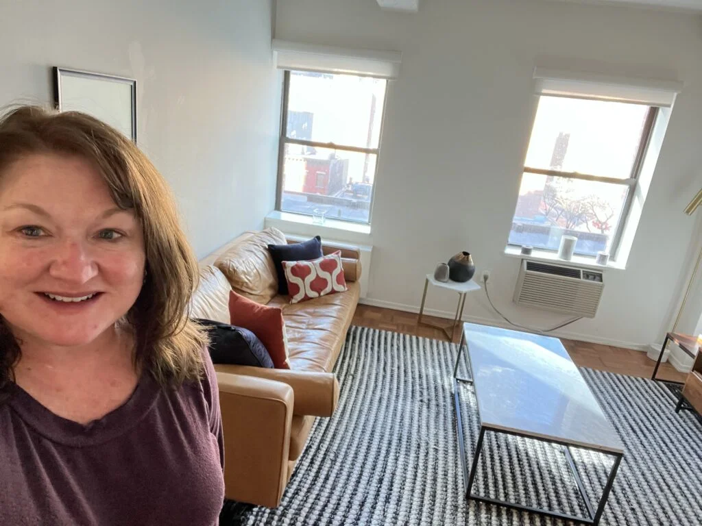 BlueGround Apartment Living Room: Cozy living room in a BlueGround rental apartment, with a sofa and minimalist decor, providing a comfortable long-term stay option.