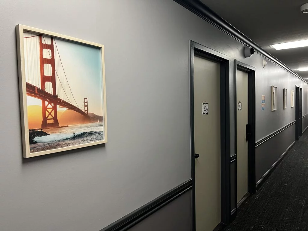 Hallway with Route 66-themed door signs.