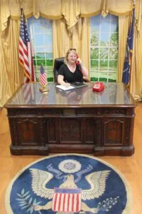 Sue at the oval office desk