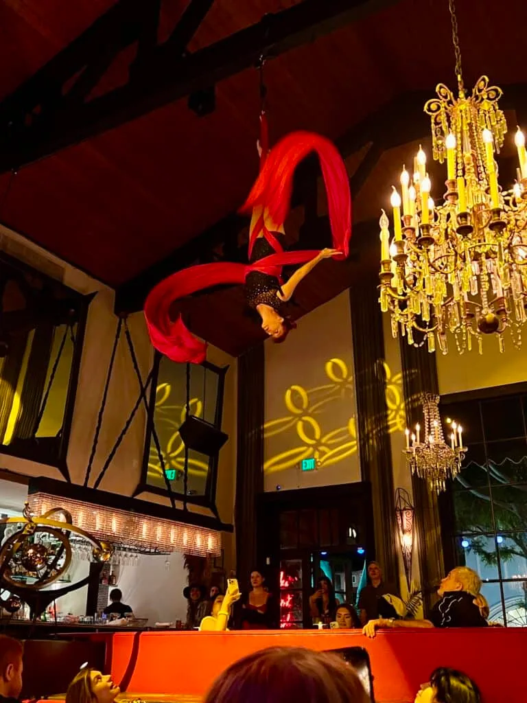 12 Fun and Unique Themed Restaurants in Los Angeles 48 La Boheme restaurant West Hollywood burlesque acrobatic dancer