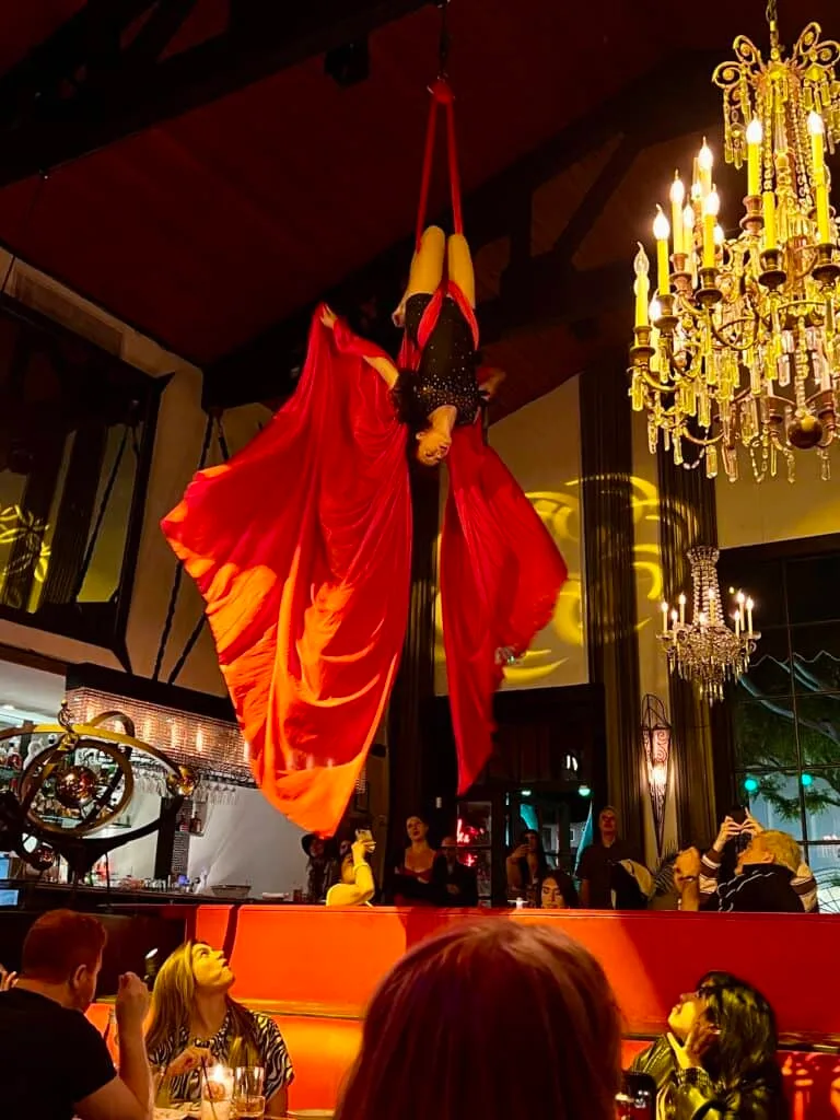 12 Fun and Unique Themed Restaurants in Los Angeles 47 La Boheme restaurant West Hollywood burlesque acrobatic dancer