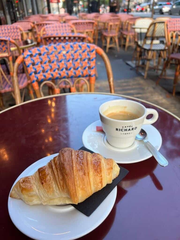 Planning a Trip to Paris for the First Time (What Actually Helps) 8 A croissant and coffee at Brasserie Madeleine, Bd de Bonne Nouvelle