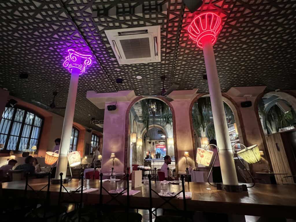 Where to Eat in Barcelona: My Honest Guide to Great Spots near the Big Sites 9 Interior of Carmina restaurant near the Picasso Museum Barcelona with colorful atmospheric lighting