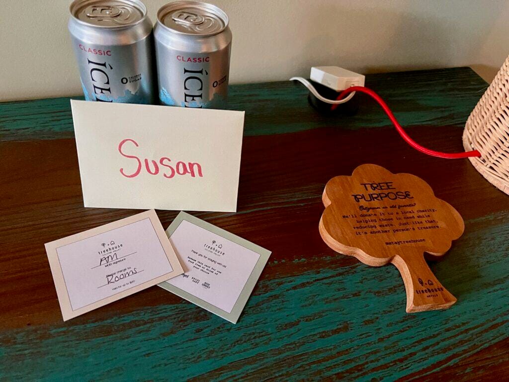 Treehouse Hotel Silicon Valley complimentary sparkling water, handwritten note, and credit vouchers