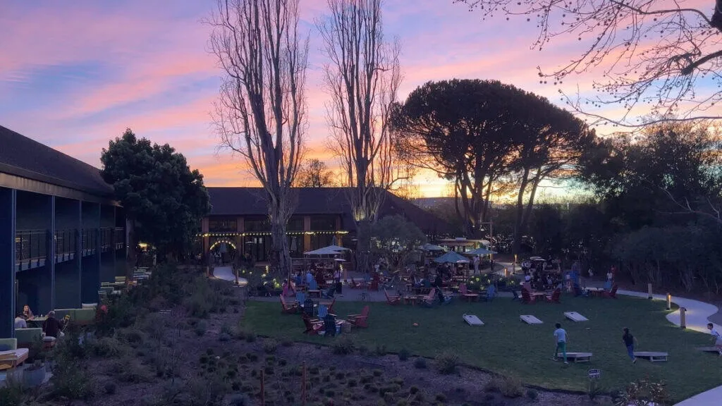 I Stayed at the Treehouse Hotel Silicon Valley. Here's the Truth. 14 Treehouse Hotel Silicon Valley Beer Garden at sunset