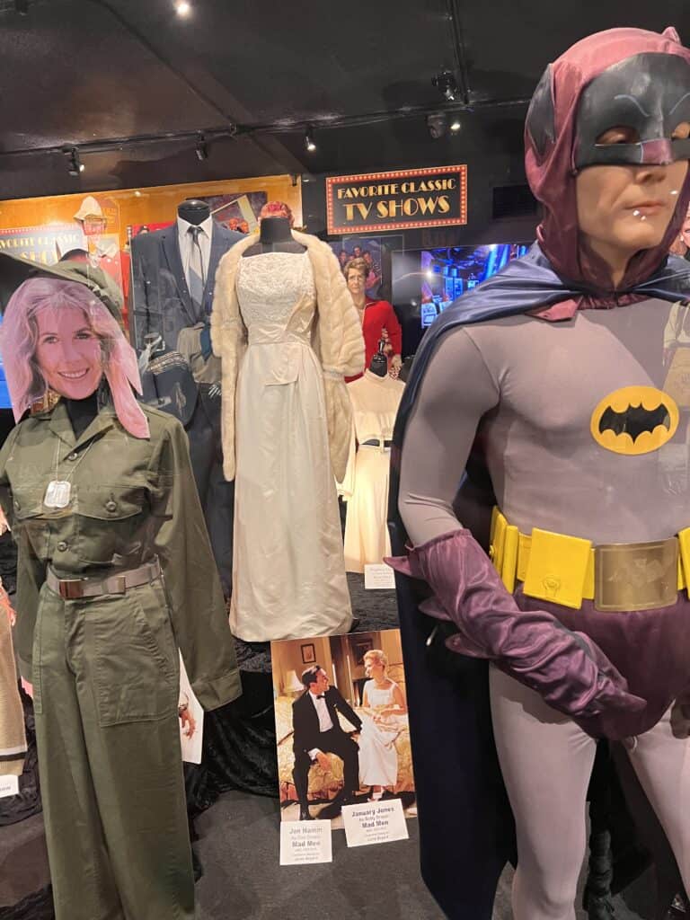 Original costumes from Hotlips, Don and Betty Draper, and Batman at the Hollywood Museum