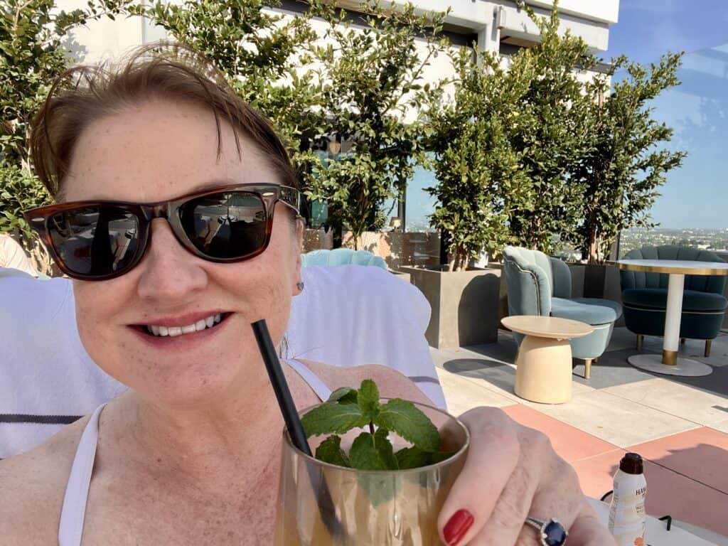 Woman enjoying a drink outdoors
