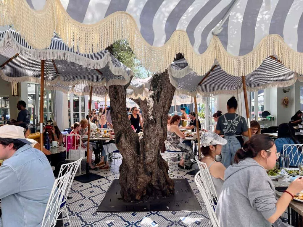 12 Fun and Unique Themed Restaurants in Los Angeles 2 outdoor patio seating at The Butcher The Baker and The Cappuccino Maker West Hollywood