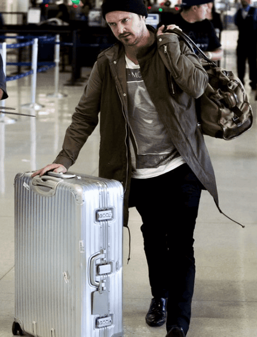I Tested the Level 8 Gibraltar Aluminum Carry-On for a Weekend in LA. Here’sWhat I’d Tell a Friend. 3 Aaron Paul with aluminum suitcase