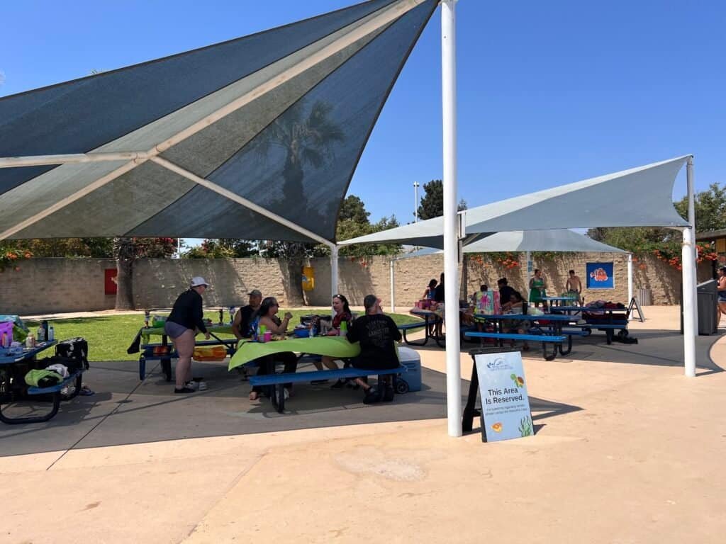 Covered picnic table rental area at the Morgan Hill Aquatics Center