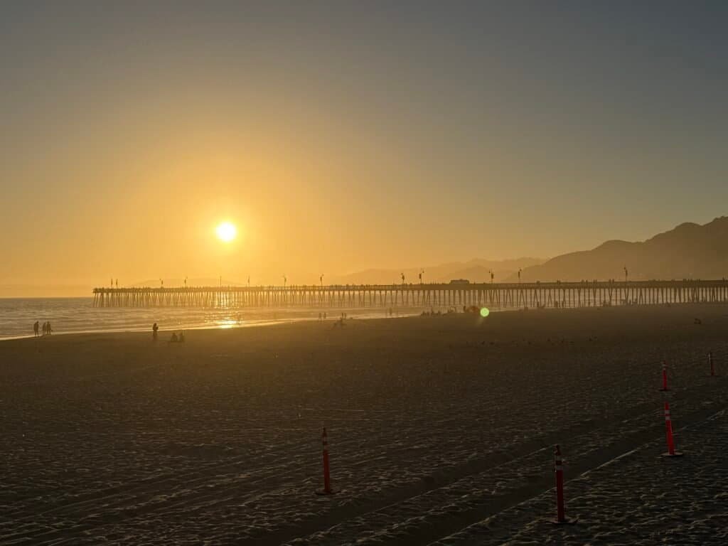 Pacific Point Resort Pismo Beach Review: What It’s Really Like to Stay (With My Dog) 14 Wide, flat expanse of sand at Pismo Beach with the surf coming in