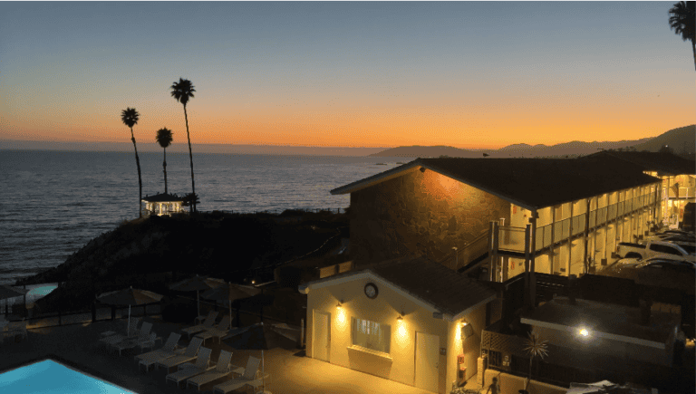 Pacific Point Resort Pismo Beach Review: What It’s Really Like to Stay (With My Dog) 1 Sunset over the Pacific seen from the guest room window at Pacific Point Resort in Pismo Beach