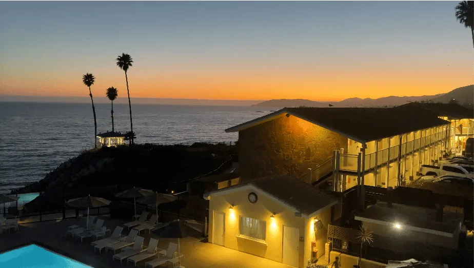 Pacific Point Resort Pismo Beach Review: What It’s Really Like to Stay (With My Dog) 5 Sunset over the Pacific seen from the guest room window at Pacific Point Resort in Pismo Beach