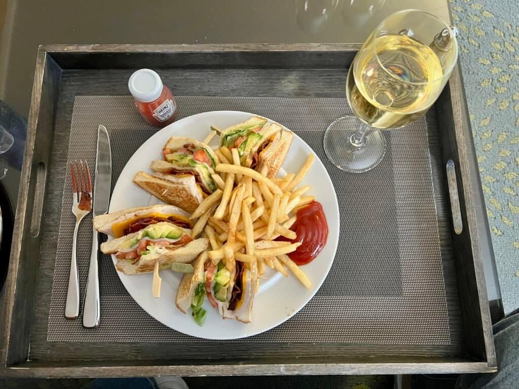 Crowne Plaza Palo Alto Review: The Beatles, a Balcony, and a Dog Who Ruined My Pool Plans 16 Turkey club sandwich and French fries delivered by room service at Crowne Plaza Palo Alto